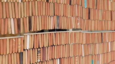 Image of a beaded clay curtain made by Abedar Kamgari.