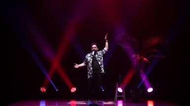 performance documentation of Izad on stage during a rehearsal