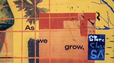 Yellow background, collaged elements of orange tinted white bricks, painted lettering on a window that says "store closi- sa-", a plant leaf, part of a stone, and black overlaying text that says "As we grow,"