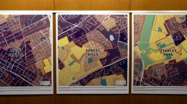 Three map squares with red borderlines and areas of yellow, red, purple, and blue.