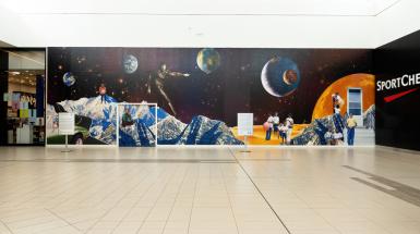 A large collage of mountains with space behind them with multiple figures throughout
