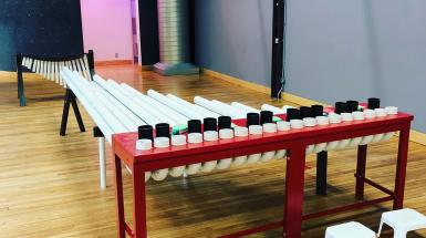 an interactive installation with recycled wood, and pvc. Amadinda has wooden bars made from a 110 year old scrapped piano.