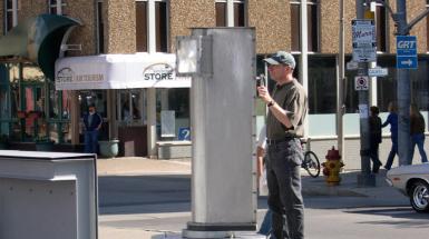 a large metal structure with blurry glass window