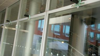 Window with short black pipes at the top