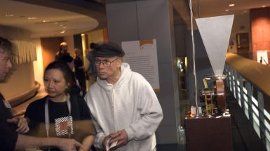 Machein n on the right people talking on left