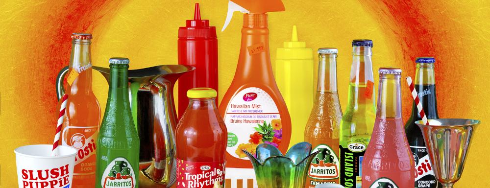 still life of domestic objects on an orange background