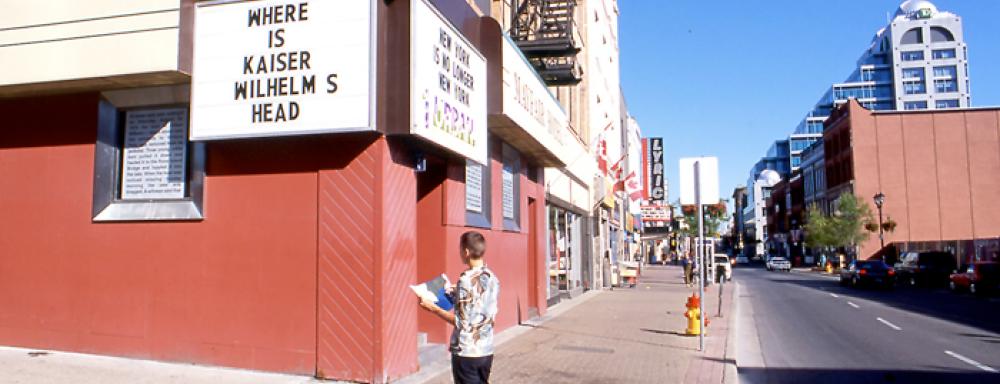 Image of red building with text that reads ....