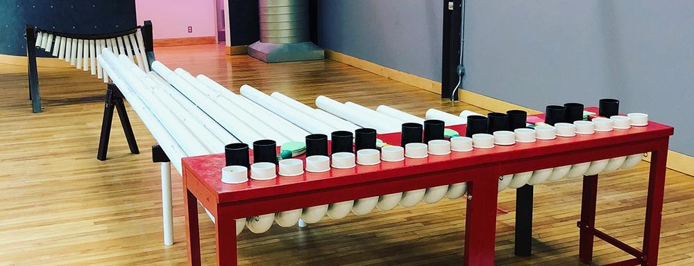 an interactive installation with recycled wood, and pvc. Amadinda has wooden bars made from a 110 year old scrapped piano.