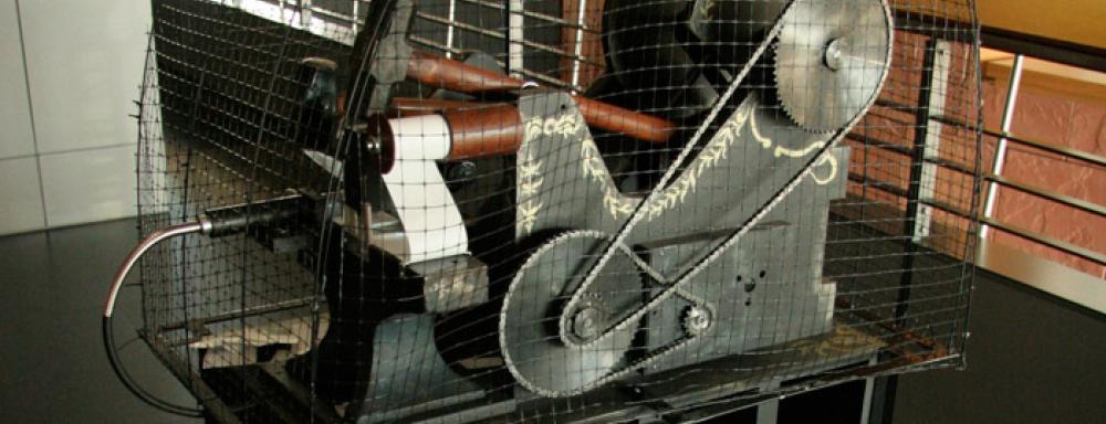 Machine in small cage 