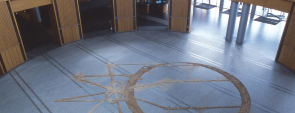 shadow of an absent merry-go-round marks made of sand