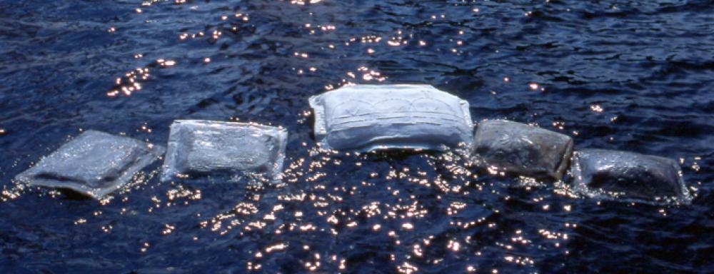 Cement pillows floating in water.