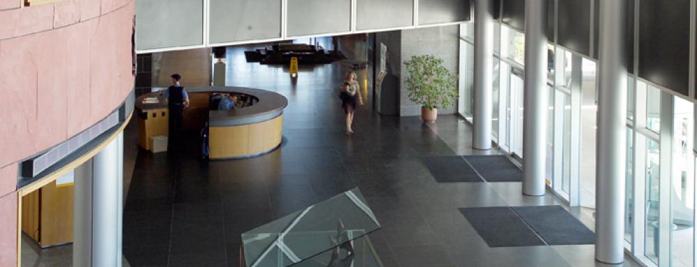 VIew looking down at steel anvil holding apart two large glass slabs 