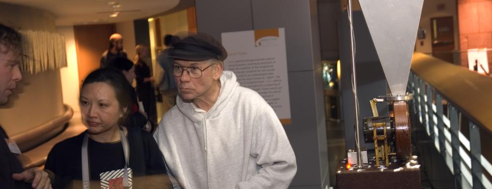 Machein n on the right people talking on left