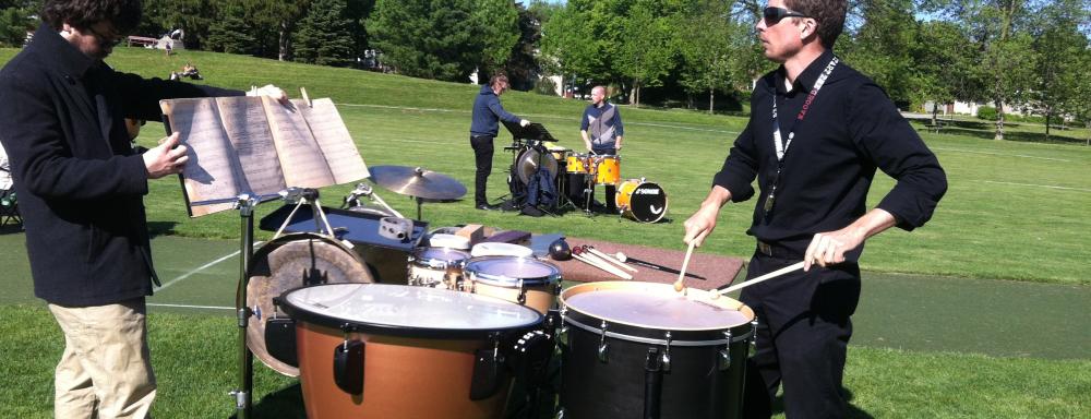 Man playing drums in park