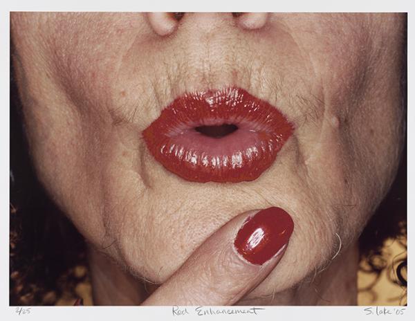 Red lips in puckered pose